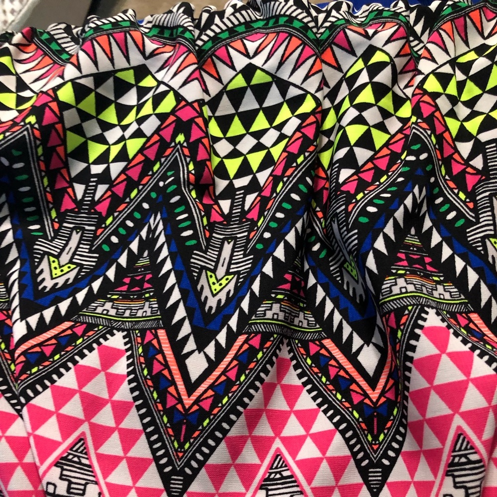 Strapless dress that hits a bit above the knees.